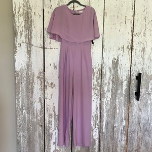 New with tags purple jumpsuit with loops for belt size medium